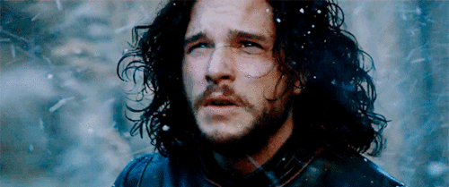 Jon Snow looks in awe as snow billows around him
