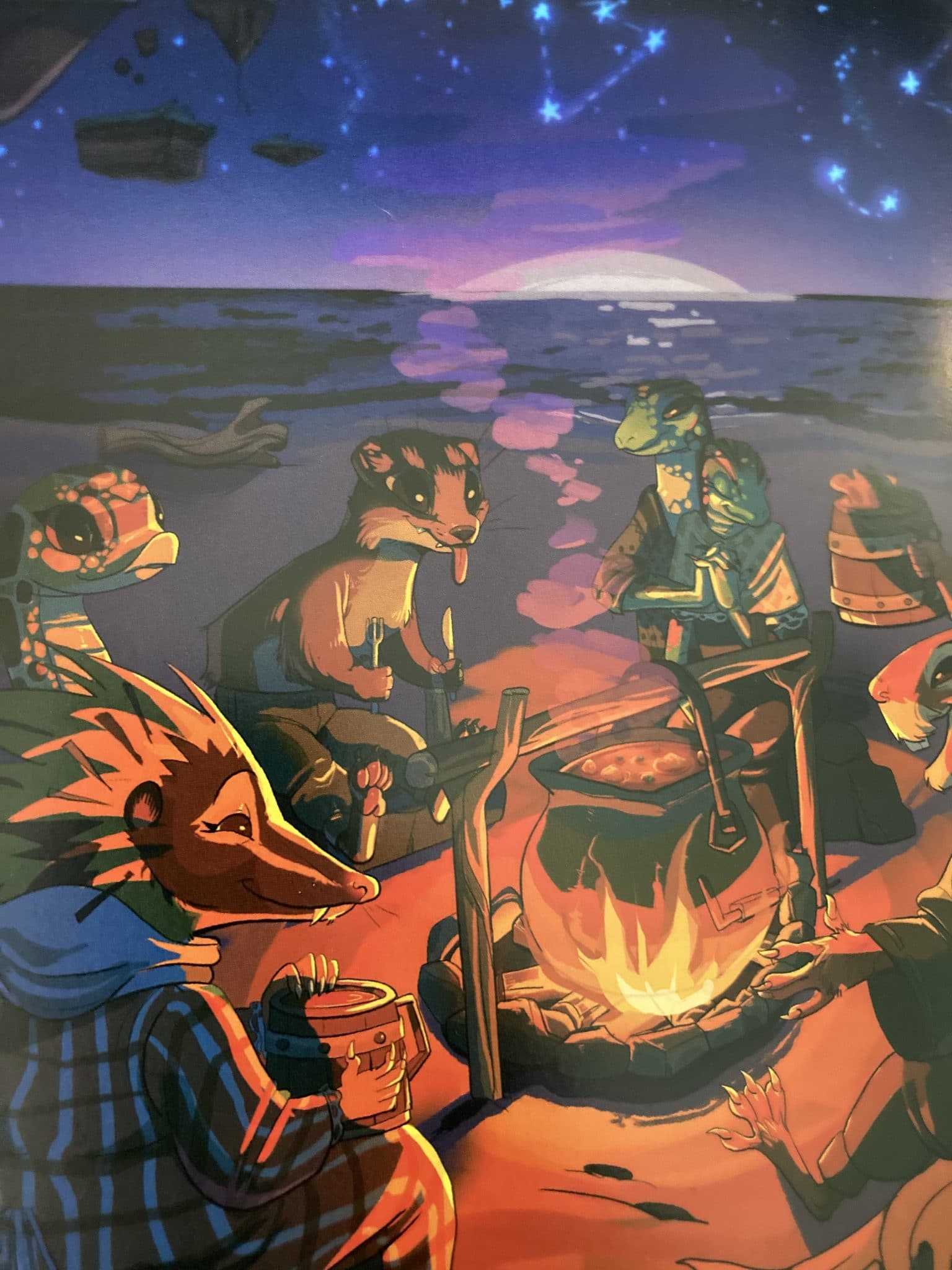 A hedgehog, rabbit, lizard, snake, and otter laugh around a campfire where a giant cauldron of stew bubbles under the starry sky.
